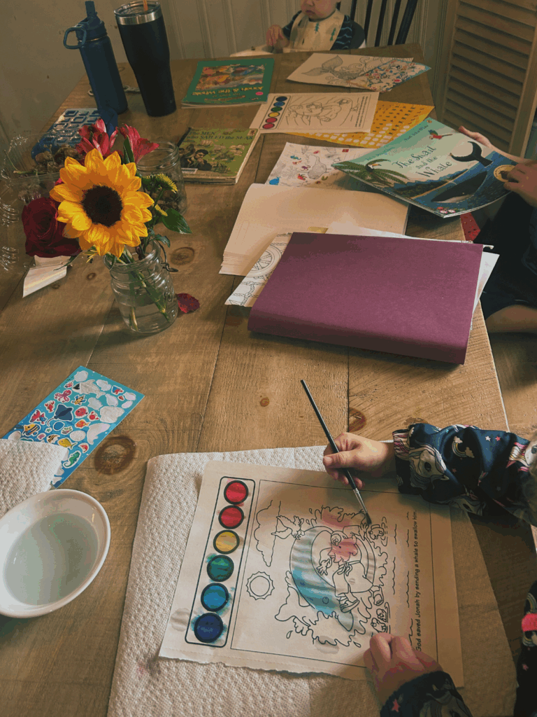 A table with art and books on it